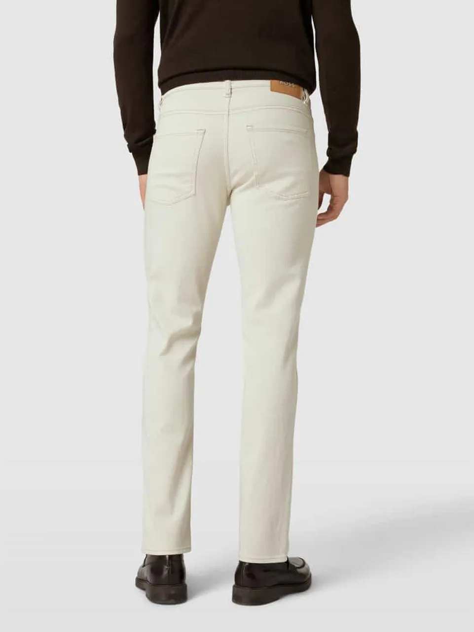 BOSS Slim Fit Jeans in unifarbenem Design Modell 'Delaware' in Offwhite