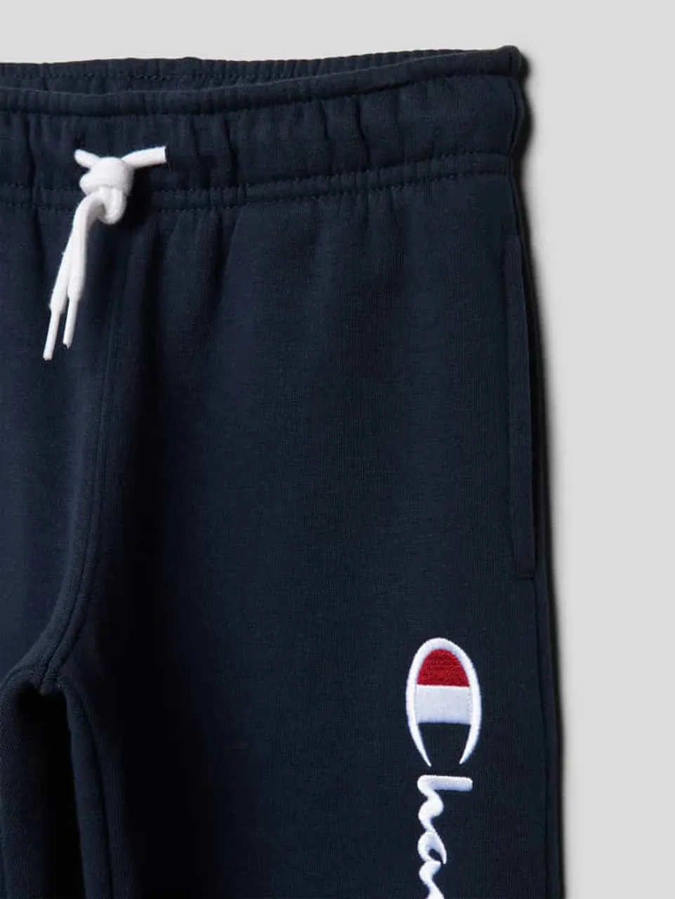 CHAMPION Sweatpants mit Label-Stitching in Marine