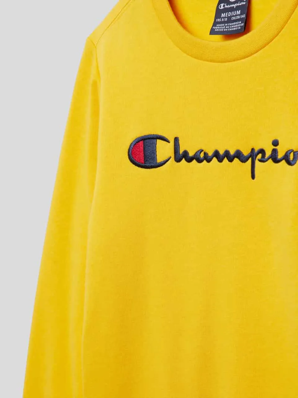 CHAMPION Sweatshirt mit Logo-Stitchings in Dunkelgelb