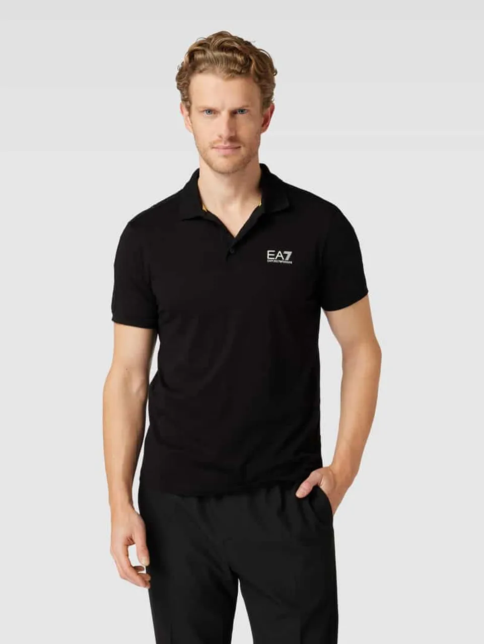 EA7 Emporio Armani Regular Fit Poloshirt mit Label-Print in Black