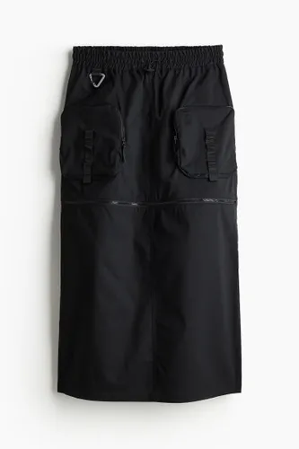 H & M - Wasserabweisender Hiking-Rock mit Zipper - Schwarz - Sportswear