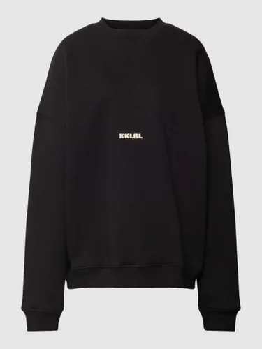 Karo Kauer Oversized Sweatshirt mit Label-Stitching Modell 'Sold Out' in Black