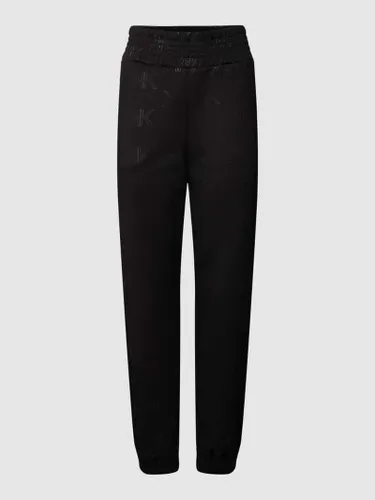 Kendall & Kylie Sweatpants mit Allover-Logo Modell 'EMBOSSED' in Black