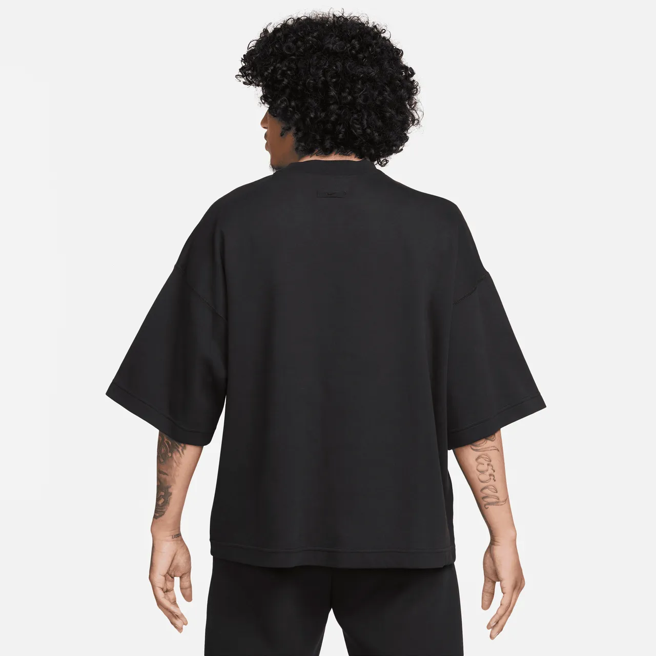 Nike Sportswear Tech Fleece Reimagined extragroßes Kurzarm-Sweatshirt für Herren - Schwarz