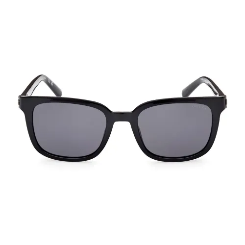 Polarisierte rechteckige Sonnenbrille mit dünnen Bügeln und Rauchgläsern Guess