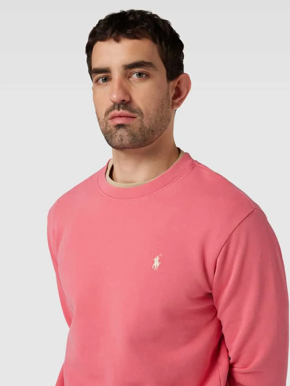 Polo Ralph Lauren Sweatshirt in unifarbenem Design mit Label-Stitching in Hellrot
