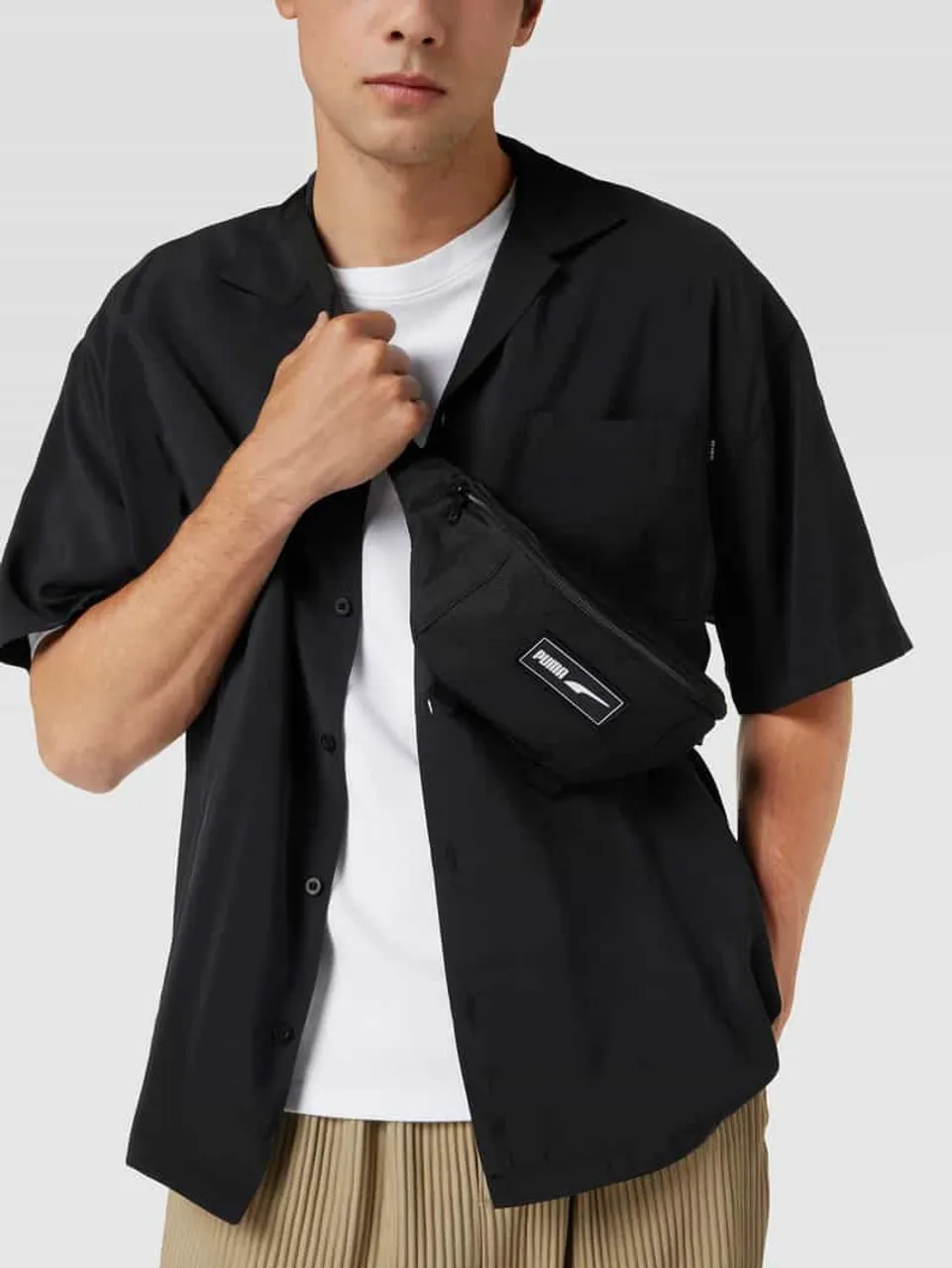 Puma Bauchtasche mit Label-Detail Modell 'PUMA Deck Waist Bag' in Black, Größe One Size