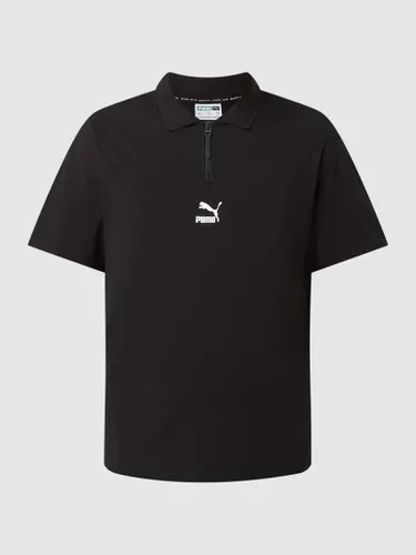 PUMA PERFORMANCE Poloshirt mit Logo-Print in Black