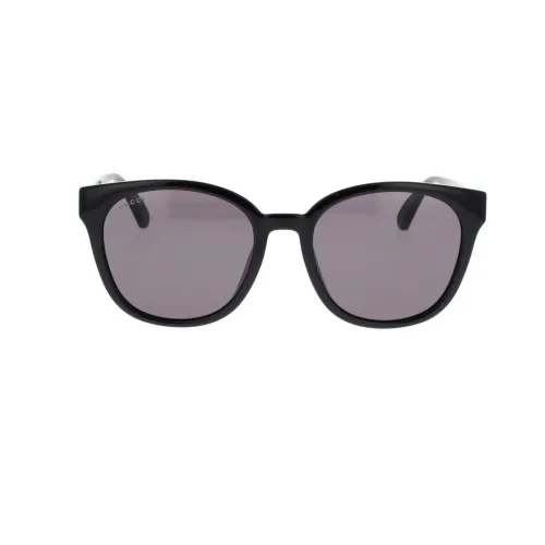 Stylische Cat-Eye Sonnenbrille mit ikonischem Webdesign Gucci