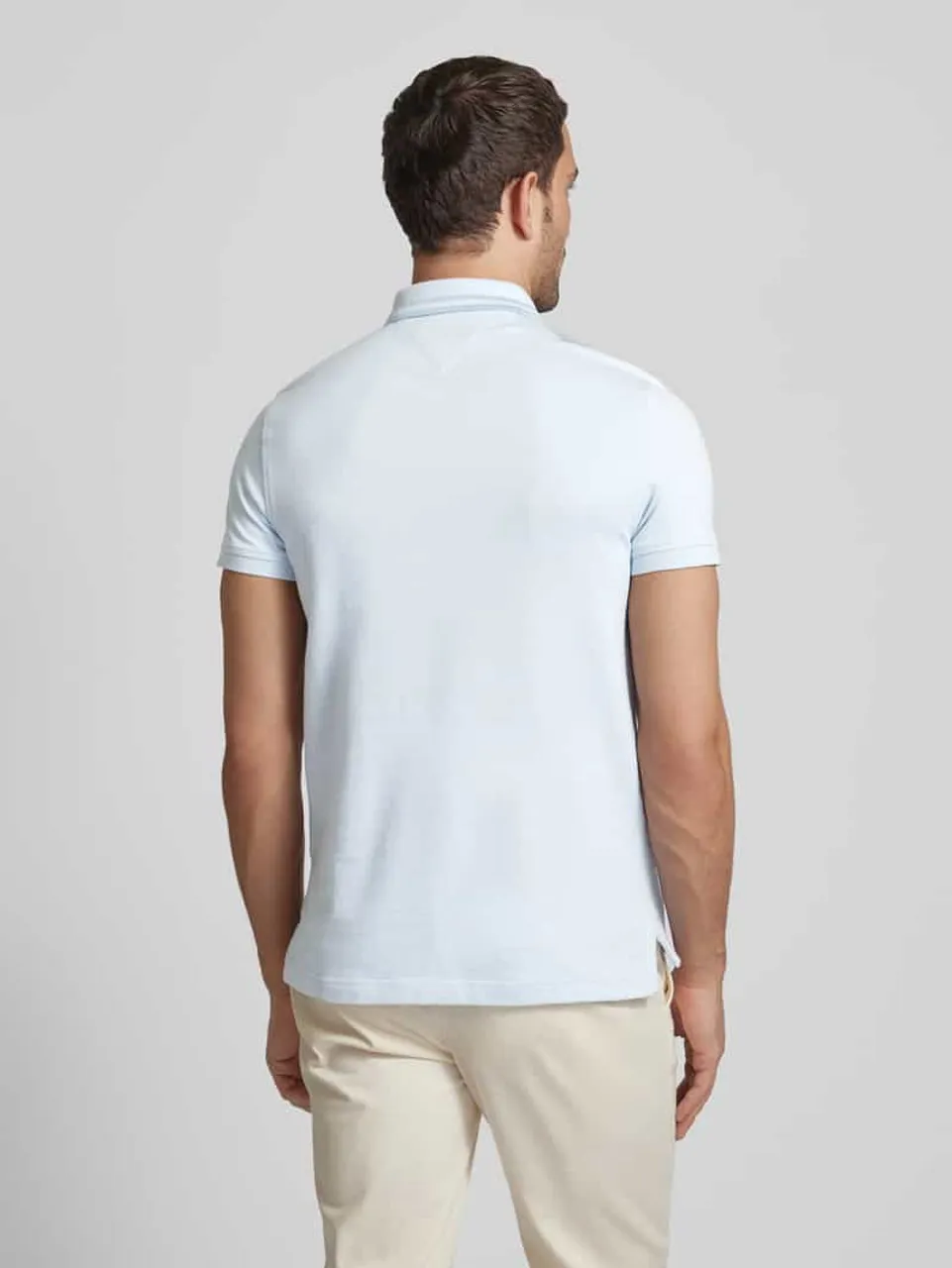Tommy Hilfiger Slim Fit Poloshirt mit Logo-Stitching Modell 'PRETWIST MOULINE' in Hellblau